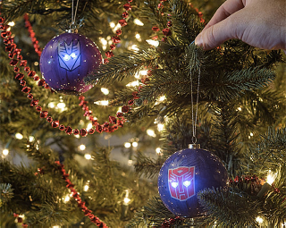 Illustration for article titled Deck the Halls Of Cybertron With Light-up Transformers Ornaments